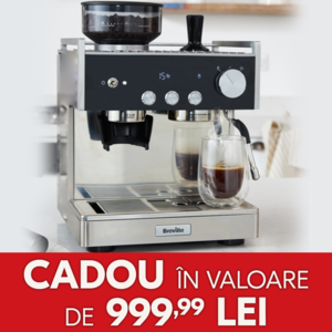 espressor barista signature cu pahar de cafea pe masa